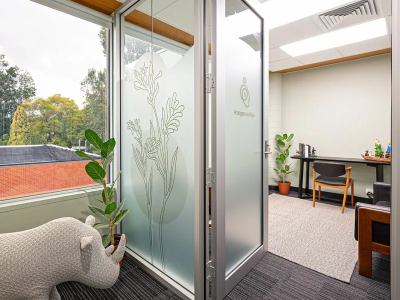 Standard suite entrance with frosted glass door